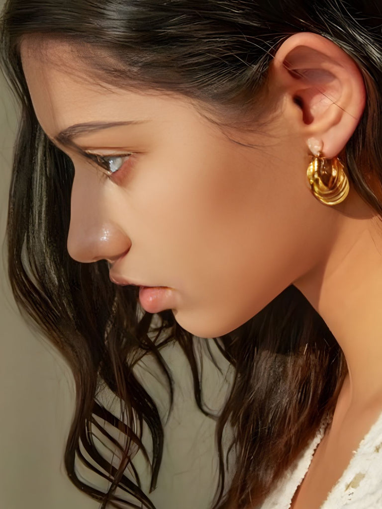 Boucles d’oreilles Mobius, acier inoxydable, plaqué or 18 carats, style géométrique, design contemporain, modèle Urielle - Boucles d'oreilles - Or 27 mm