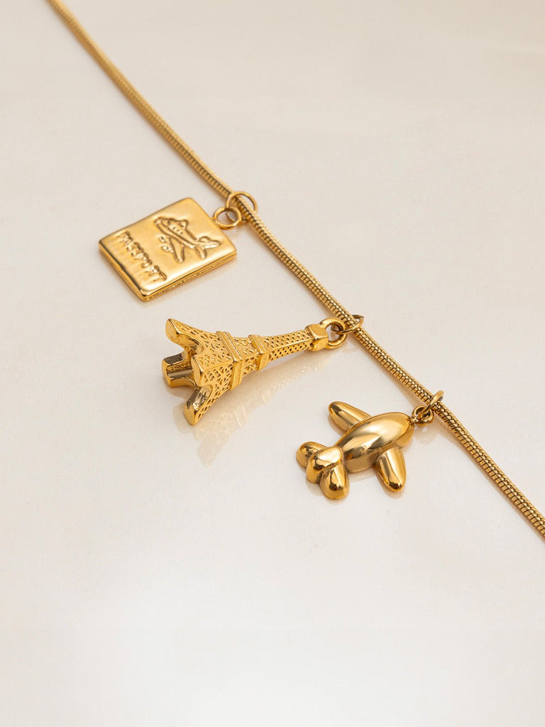 Collier doré, pendentifs voyage, avion, tour Eiffel, passeport, acier inoxydable, modèle Ninetta - Collier - Or 42 + 5 cm