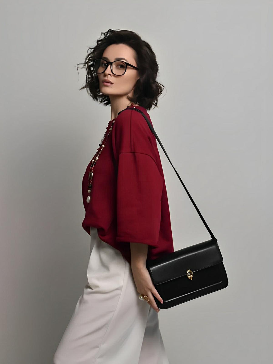 Sac à main en simili vegan, rabat élégant, design minimaliste, porté main ou épaule, format compact, modèle Cindy - Sac à main - Noir