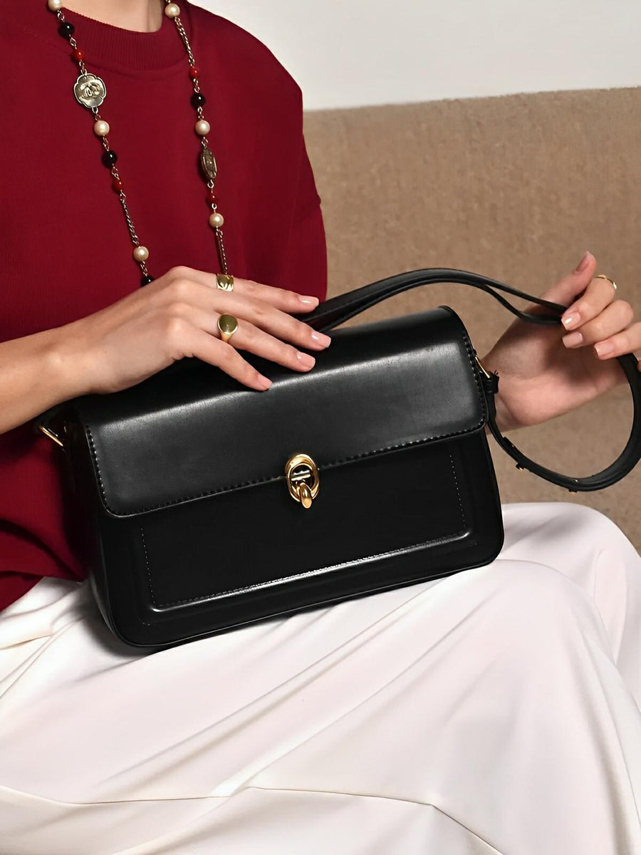 Sac à main en simili vegan, rabat élégant, design minimaliste, porté main ou épaule, format compact, modèle Cindy - Sac à main - Noir