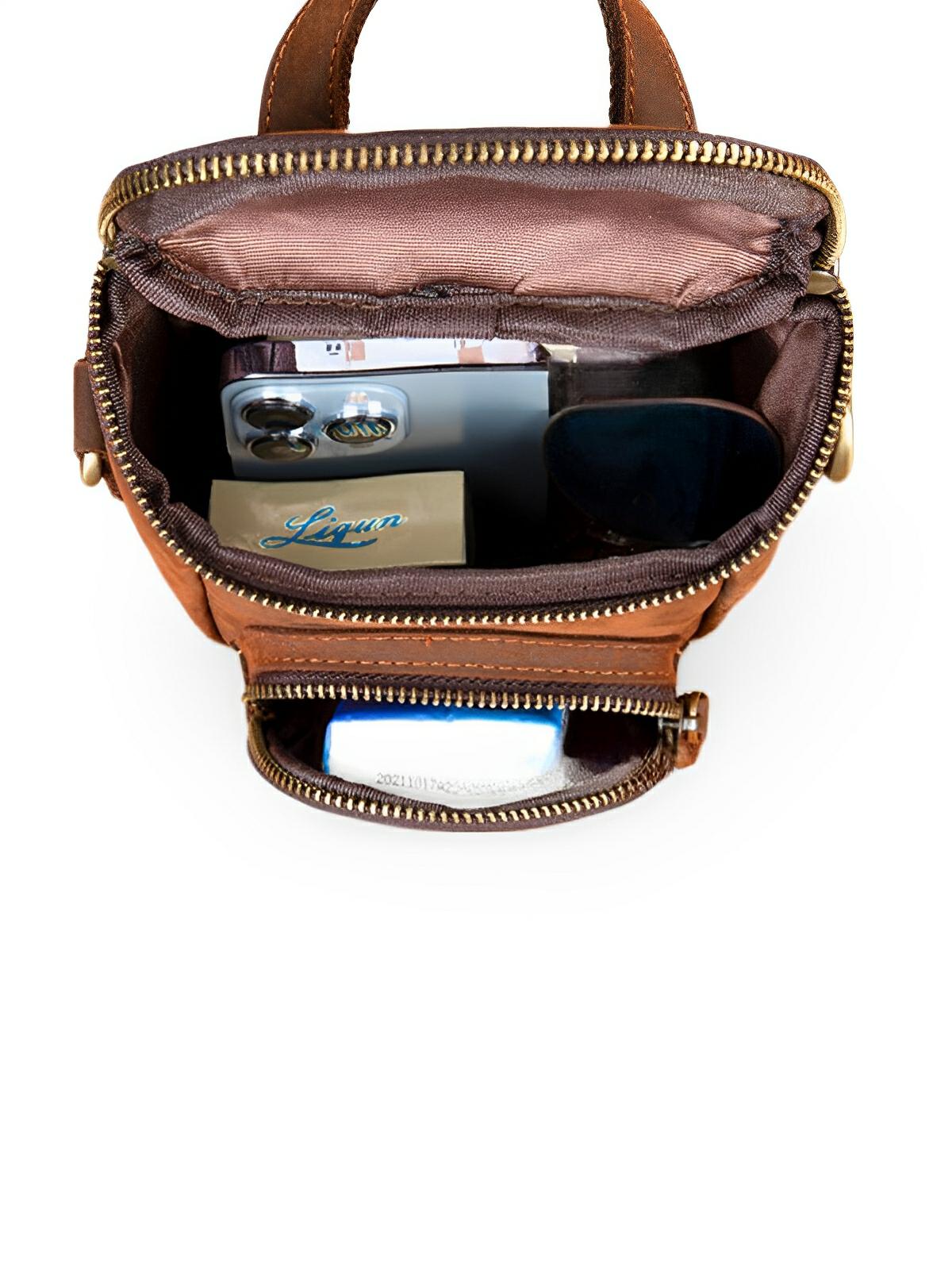 Sacoche à bandoulière en cuir, compacte et arrondie, transport minimaliste, modèle Mathelin - Sacoche - Marron